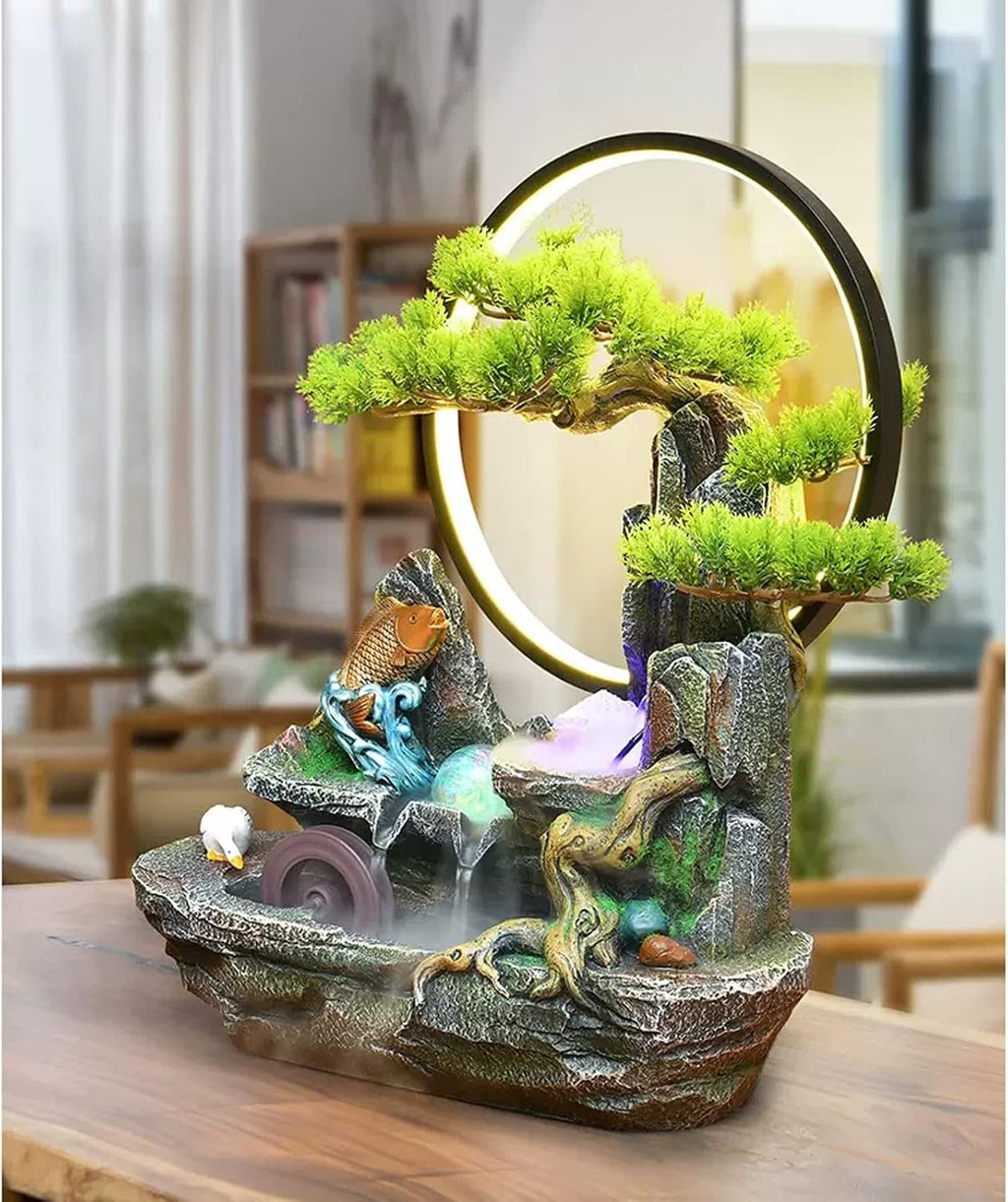 Desktop Fountain Tabletop Fountain Resin Mountain Stone Waterfall Cascading with Round LED Lights and Fake Trees Home Office Decoration Small Table Lamp